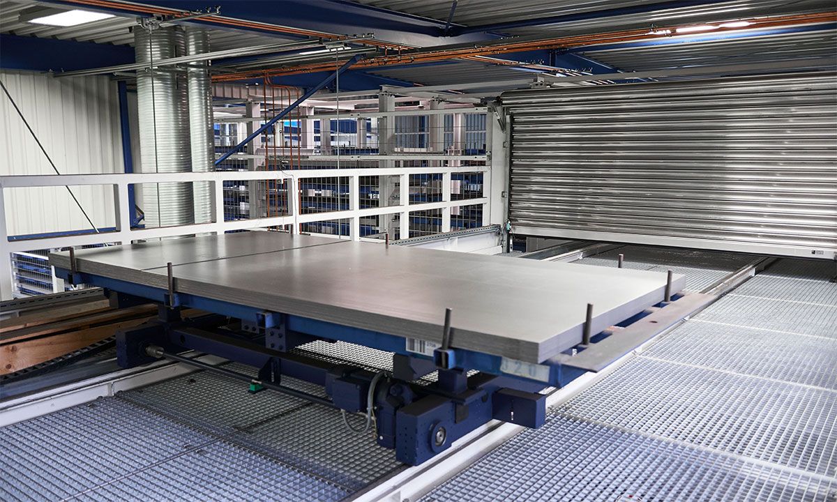 Picture: STOPA UNIVERSAL, The shuttle line, which leads over a bridge, allows each laser cutting machine to be supplied from both storage systems